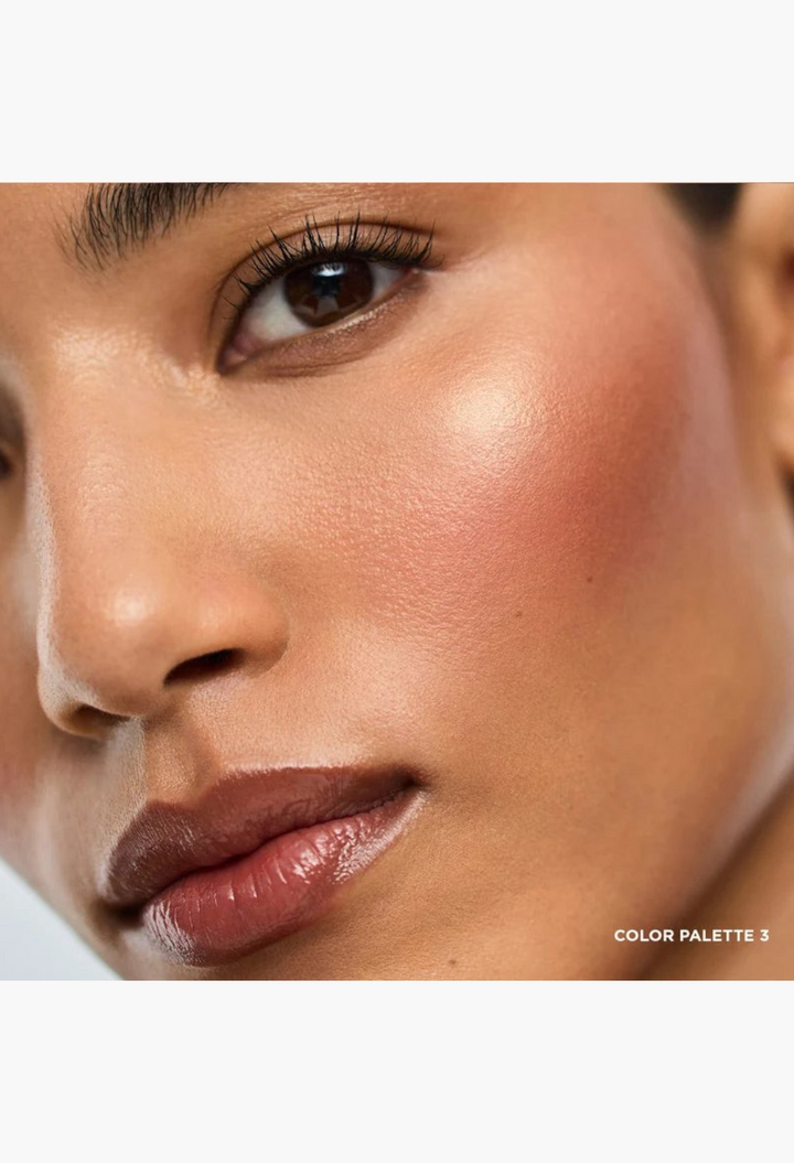 GLAM MODA Ambient Lighting Edit Unlocked Palette 3 applied on model cheek for a radiant, multidimensional glow.
