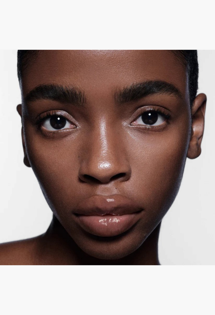 GLAM MODA Posh Balm Nourishing Lip Shine applied on a model with glowing, hydrated lips and a natural finish.