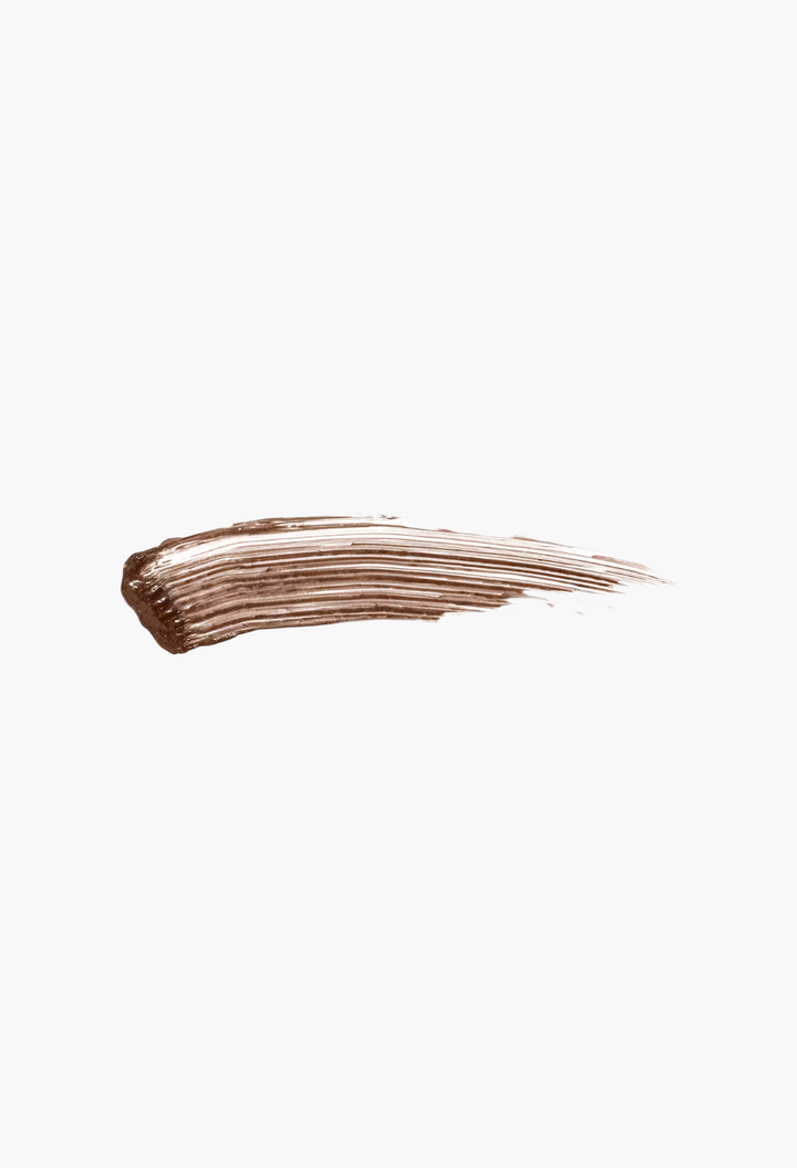 GLAM MODA Gimme Brow+ tinted eyebrow gel swatch showing a smooth, buildable brown texture for natural brow volume.