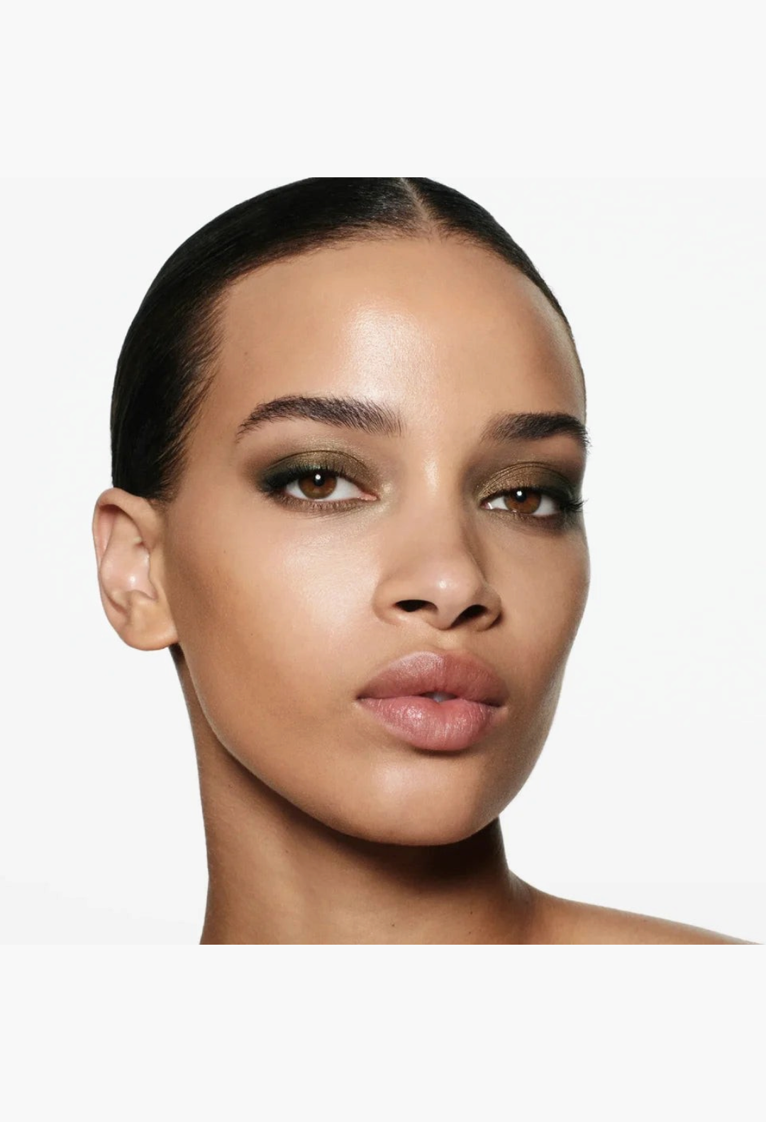 Model wearing a smoky olive green eyeshadow look created with the GLAM MODA Eye Wardrobe Multi-Finish Palette
