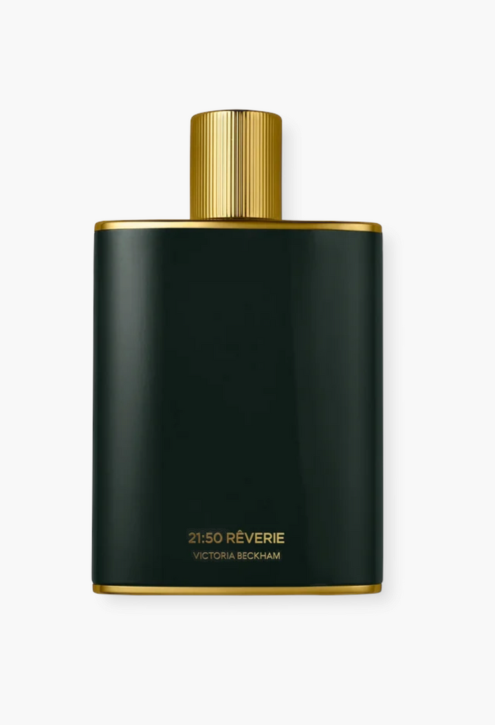 GLAM MODA 21:50 Rêverie Eau de Parfum in a sleek dark green bottle with a gold cap and gold trim details.