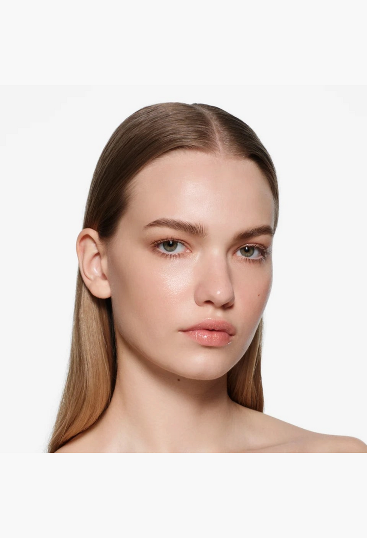 GLAM MODA Posh Balm Nourishing Lip Shine on a model with a natural, glossy, and hydrated finish.