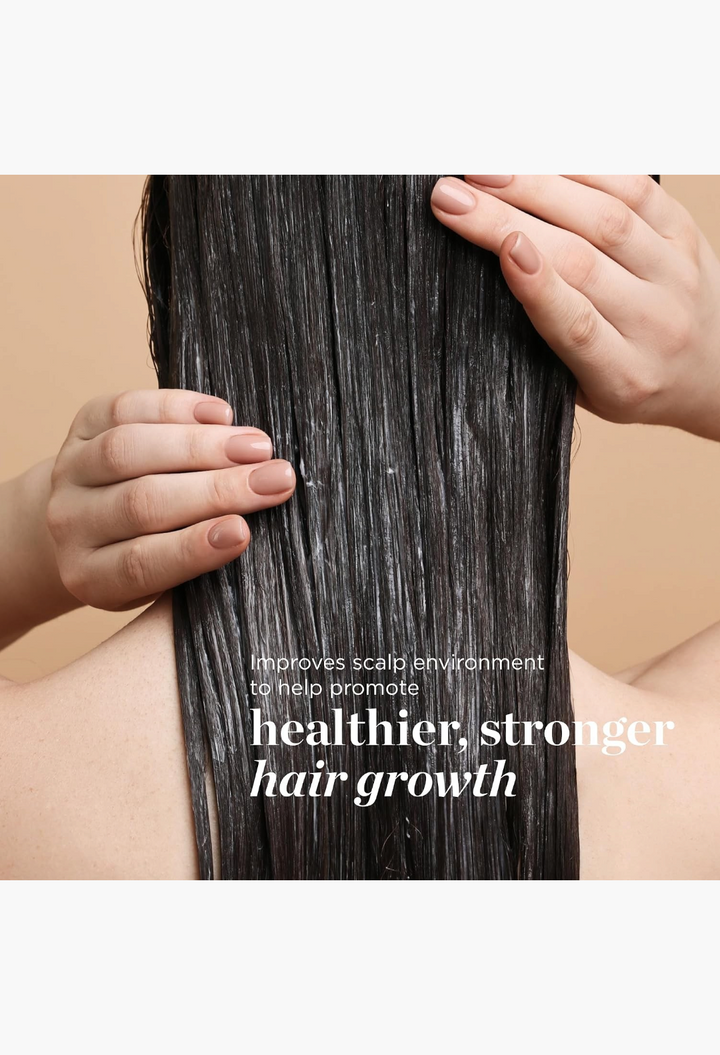 GLAM MODA Dr. Groot scalp shampoo applied to dark hair, promoting healthier and stronger hair growth.