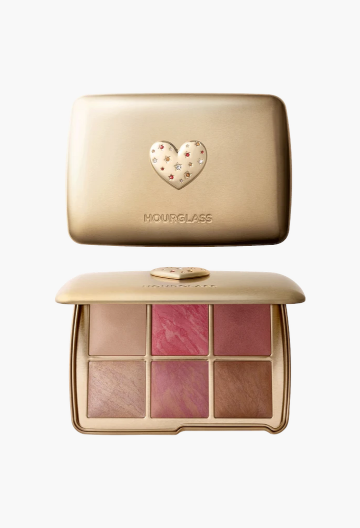 GLAM MODA Hourglass Ambient Lighting Edit Unlocked palette in gold tin with heart charm, featuring six face powders.