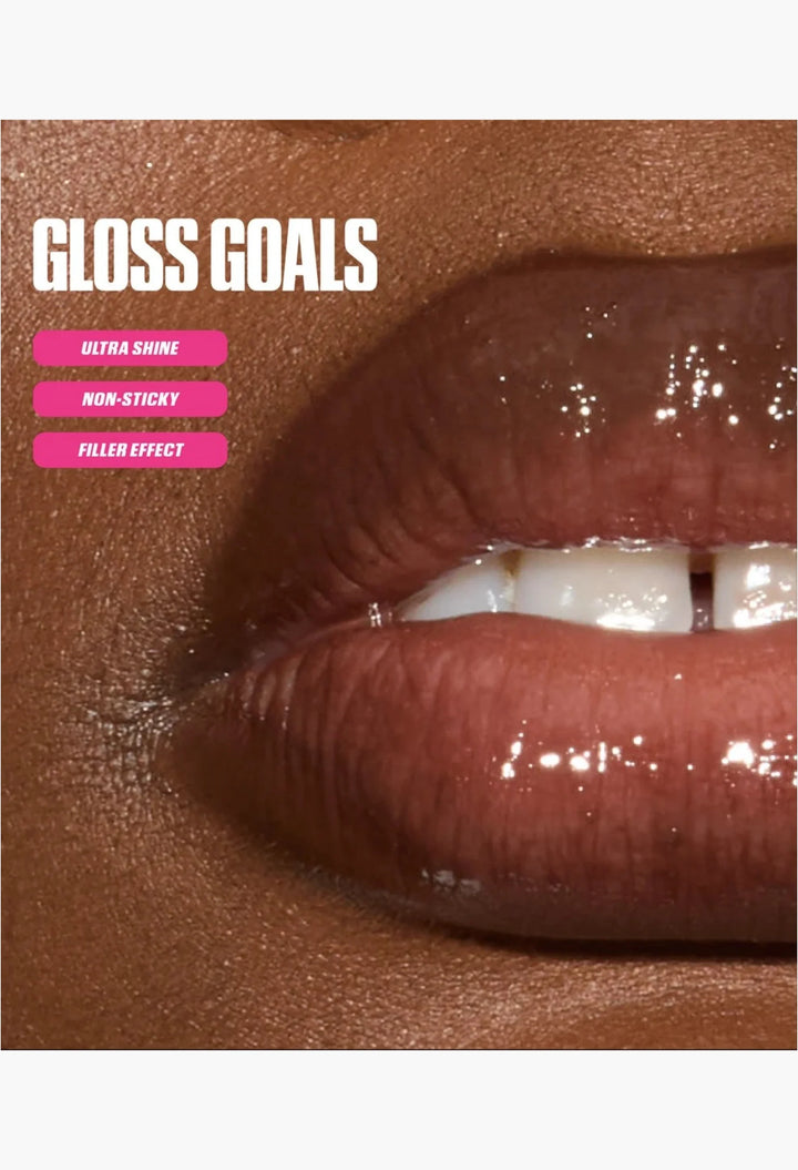 Faux Filler Extra Shine Lip Gloss LightCealer on lips