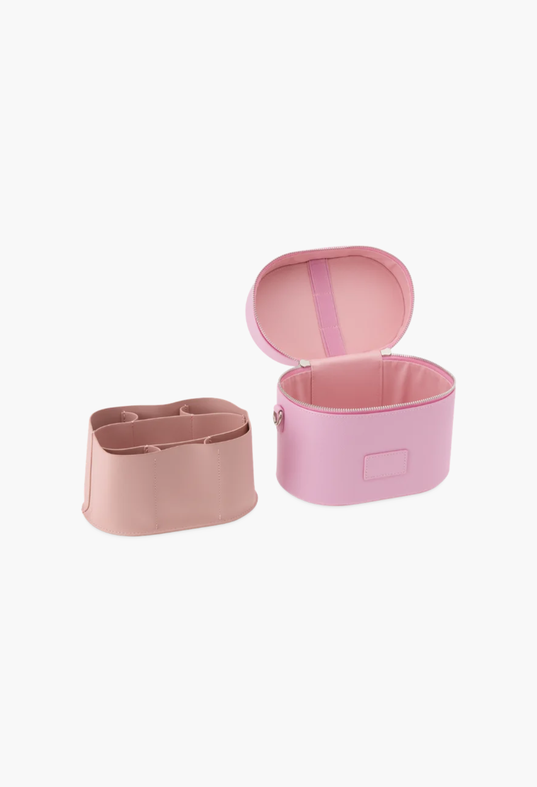 GLAM MODA oval pink vegan leather toiletry case with removable interior divider insert on a white background