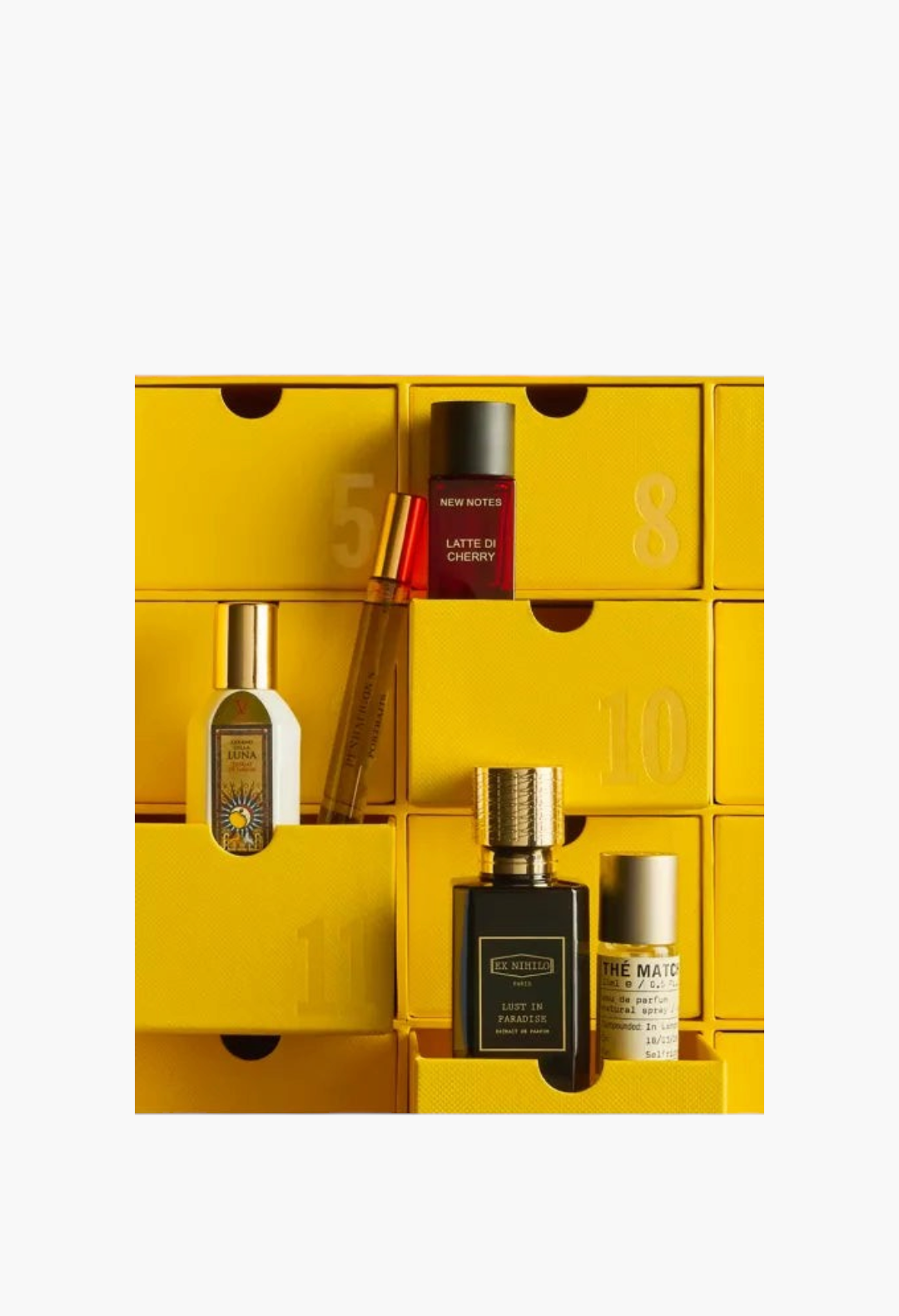 GLAM MODA Fragrance Advent Calendar 2026 featuring luxury perfume bottles in numbered yellow pull-out drawers