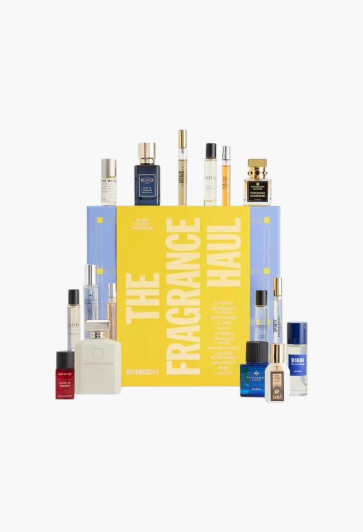GLAM MODA Fragrance Advent Calendar 2026 featuring a yellow and blue box with various luxury perfume bottles