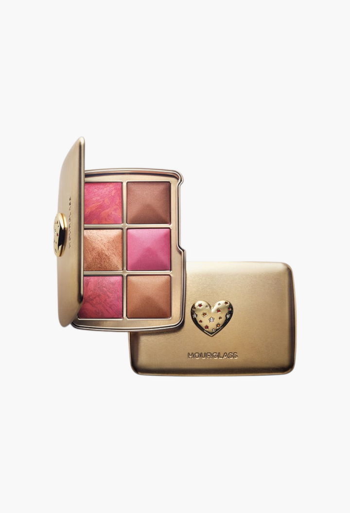 GLAM MODA Hourglass Ambient Lighting Edit Unlocked palette in gold tin case with heart charm and six powder shades.