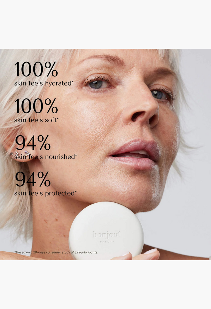 GLAM MODA Le Balm unscented solid serum held by a woman with glowing skin, featuring clinical trial results text