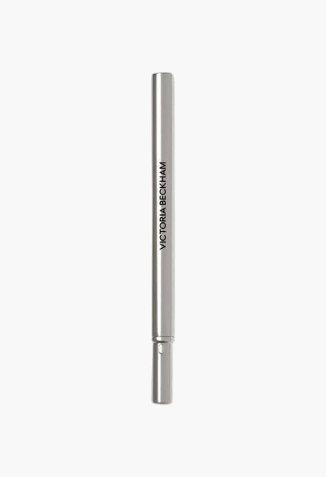GLAM MODA Victoria Beckham Beauty Lip Definer lip pencil in a sleek silver metallic casing.
