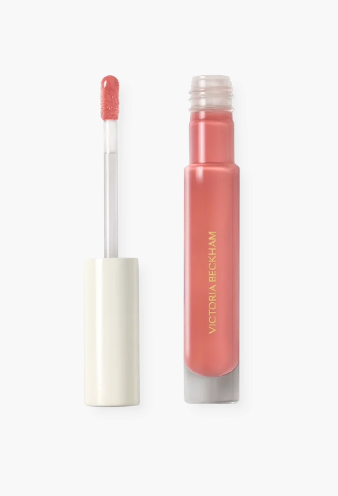 GLAM MODA Posh Gloss High Shine Lip in a soft peach shade with a doe foot applicator and sleek glass tube packaging.