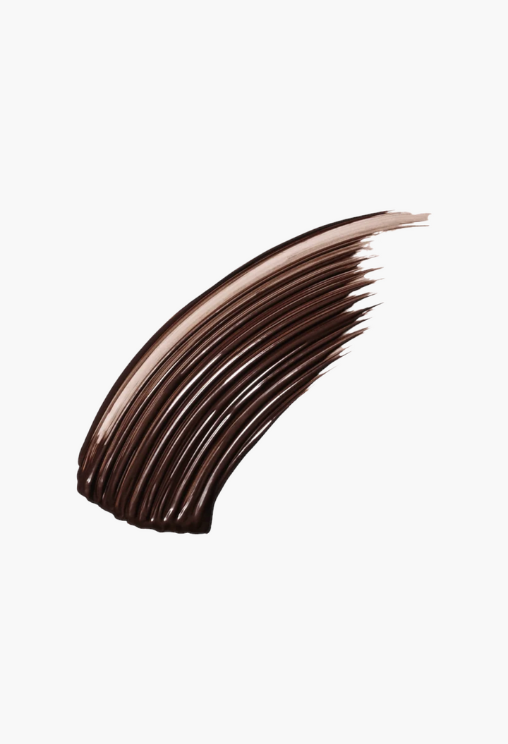 GLAM MODA Victoria Beckham Beauty Vast Lash mascara swatch showing a rich, dark brown creamy texture.
