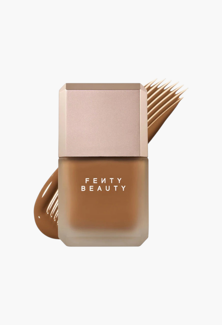 GLAM MODA Fenty Beauty Pro Filt'r longwear liquid foundation in a frosted glass bottle with a tan shade swatch